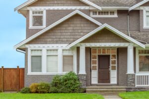 exterior of home with new siding, windows, and front door