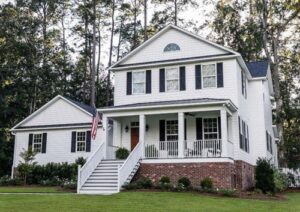 exterior of quant home with new siding and windows